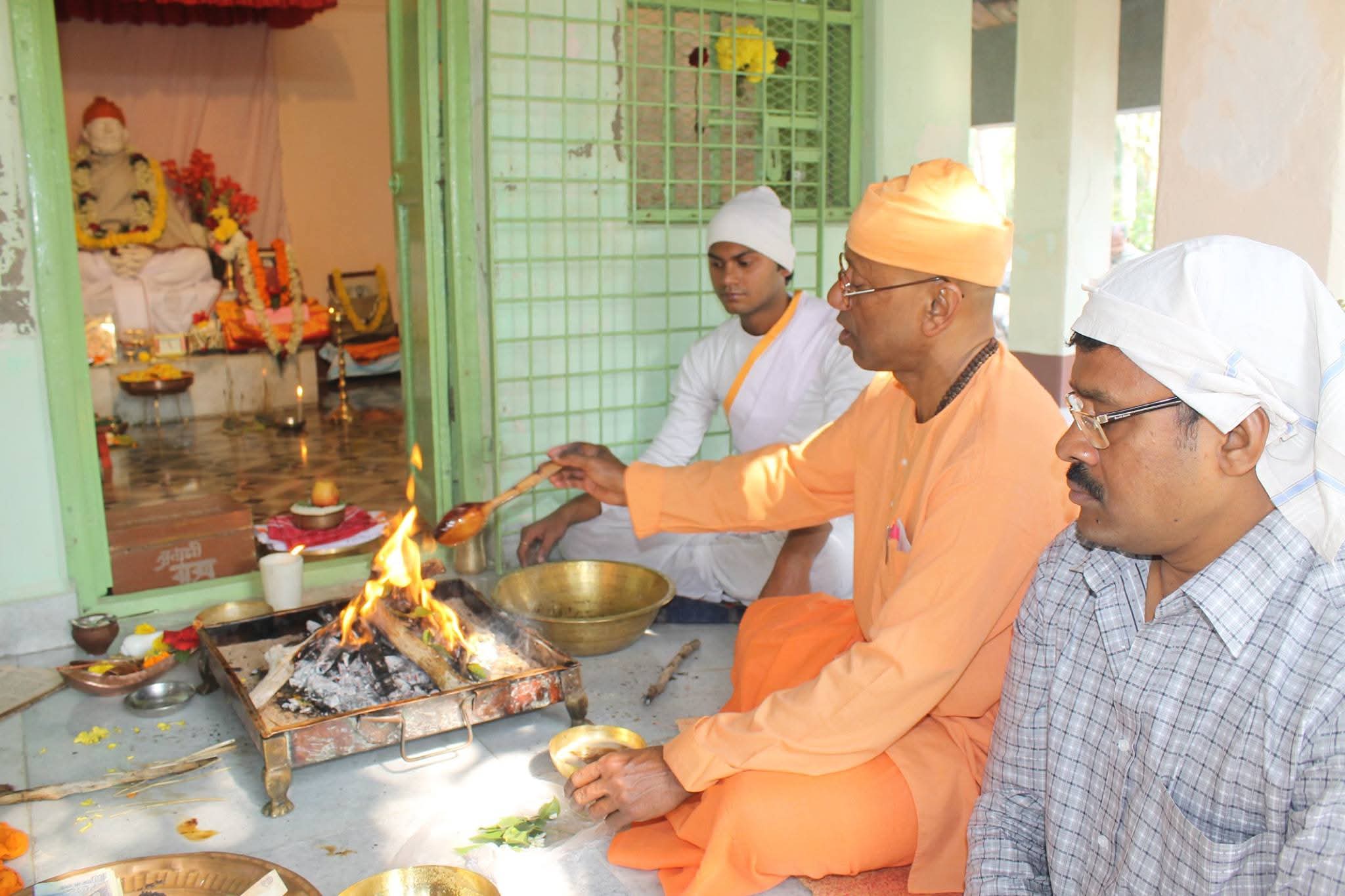 Ashram spiritual ritual with devotees